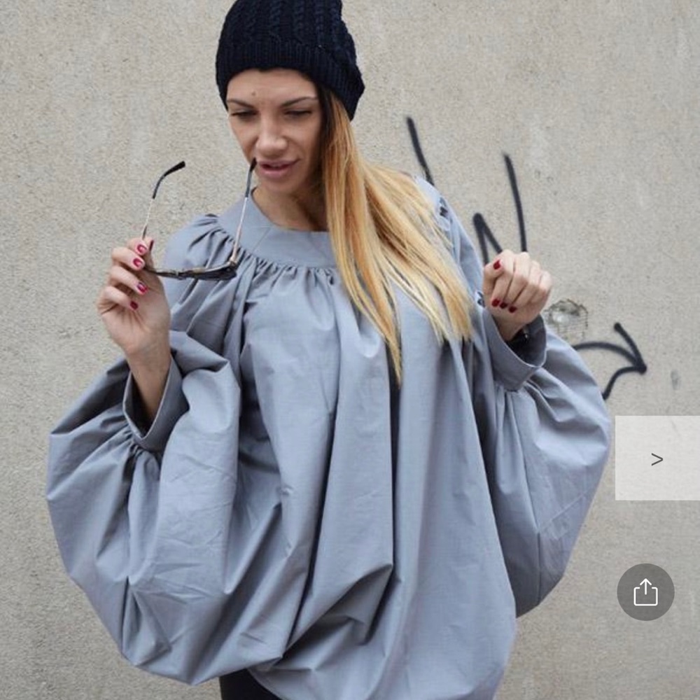 Oversize Batwing sleeves ruffle top.